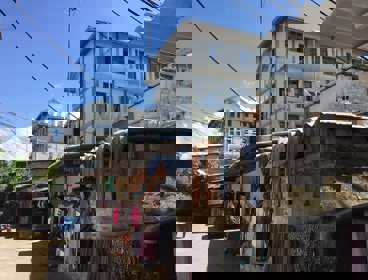 A street scene with drying clothes in Colombo