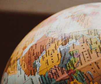 Close up of a globe orientated to show the Middle East and central Asia. 