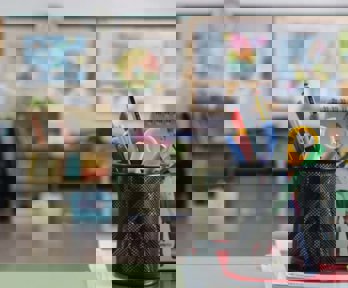 Pen pot on the side in a classroom